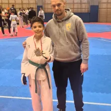 Alek Kentzer-Rudzki z medalem