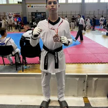 Tymoteusz Chybiński z medalem