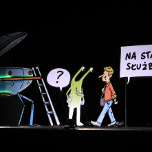 Rysunkowa instalacja świetlna, przedstawiająca ufoludka, pojazd kosmiczny i mężczyznę